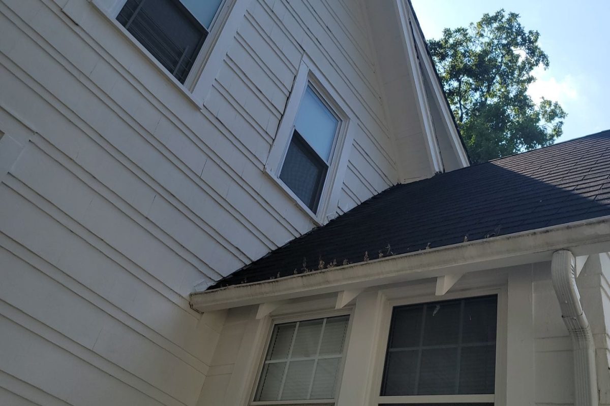 Seamless gutter installed along roof edge